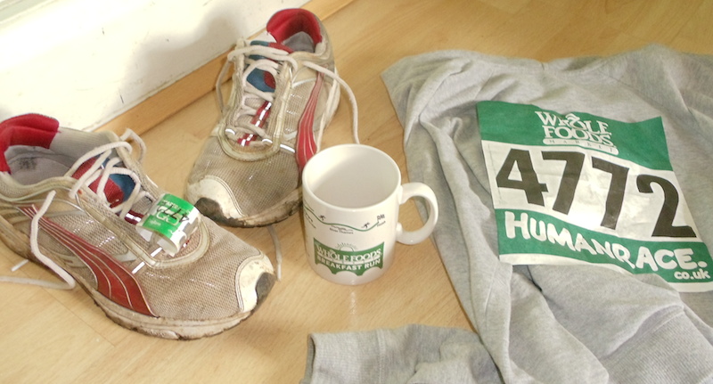 A running mug, dirty trainer s (gross) and my number.
